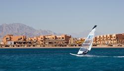 Soma Bay - Red Sea. Beach hotel with windsurfer.